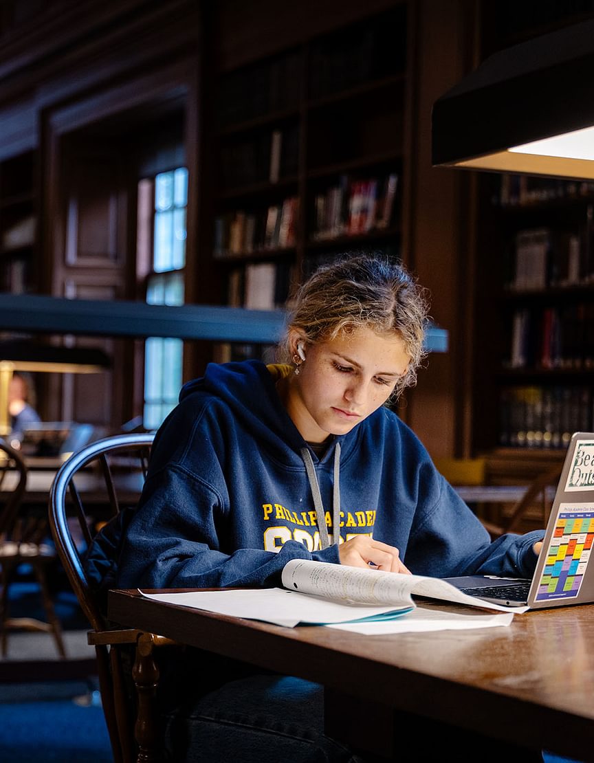 Student working at a desk in the OWHL