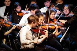 Students on stage in Portugal