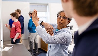 Faculty member in class teaching