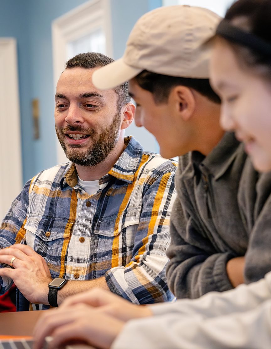 Nicholas Zufelt in the classroom with students