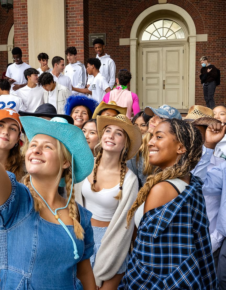 Students talking a selfie outside of Cochran Chapel