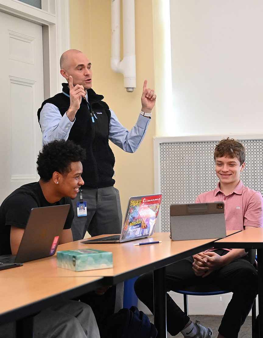 Ben Temple P’28 and students in the classroom