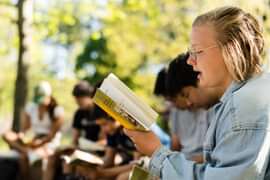 Student reading a book.