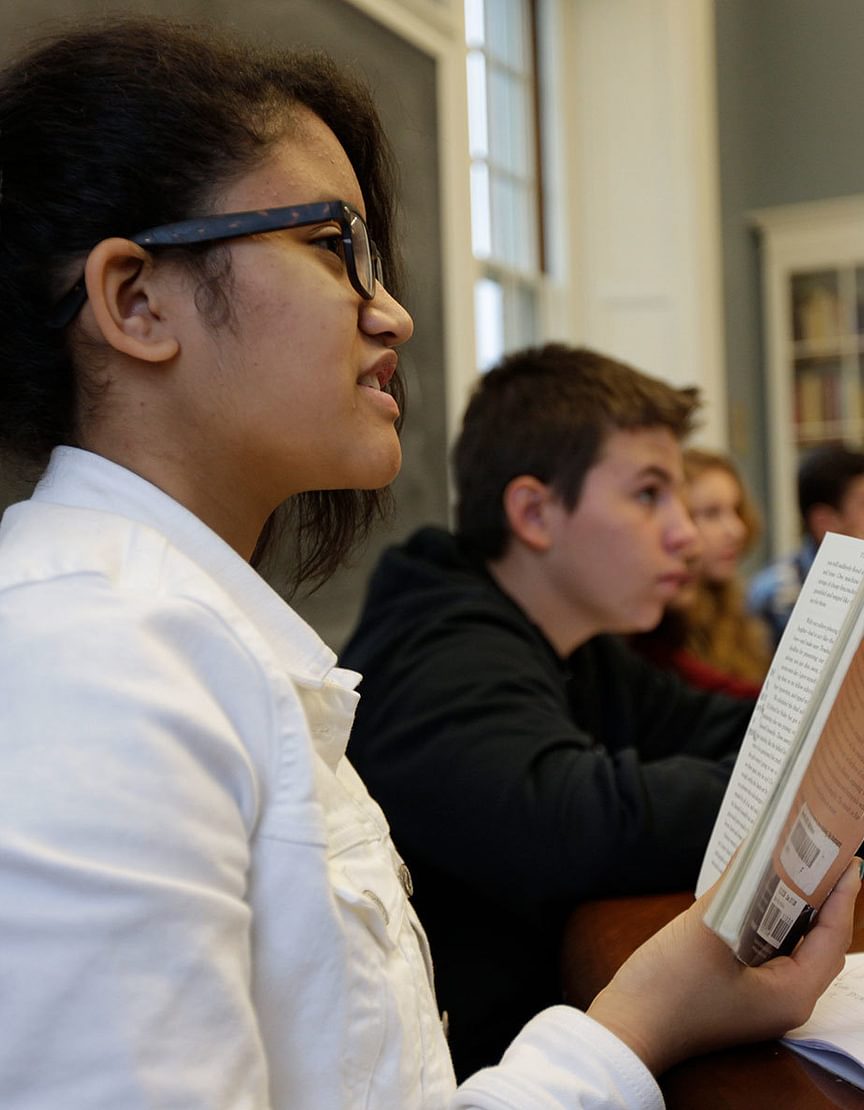 Student Reading in a Classroom